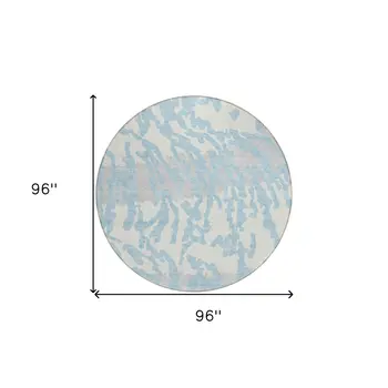 8' Sky Blue Gray And Ivory Round Animal Print Washable Indoor Outdoor Area Rug