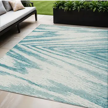 5' X 8' Teal Blue And Ivory Abstract Washable Indoor Outdoor Area Rug