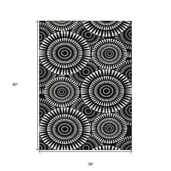 3' X 5' Black And Ivory Geometric Washable Indoor Outdoor Area Rug