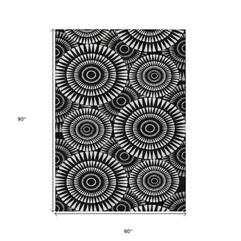 5' X 8' Black And Ivory Geometric Washable Indoor Outdoor Area Rug