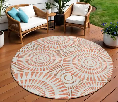 8' Coral And Ivory Round Geometric Washable Indoor Outdoor Area Rug
