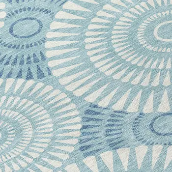 5' X 8' Teal Blue And Ivory Geometric Washable Indoor Outdoor Area Rug