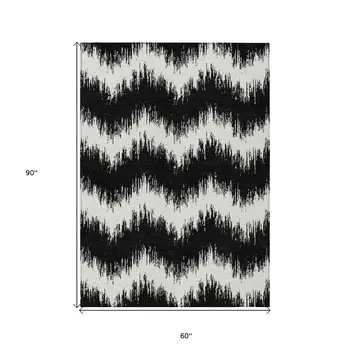 5' X 8' Black And Ivory Chevron Washable Indoor Outdoor Area Rug