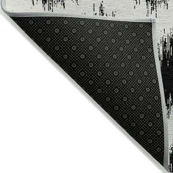 5' X 8' Black And Ivory Chevron Washable Indoor Outdoor Area Rug