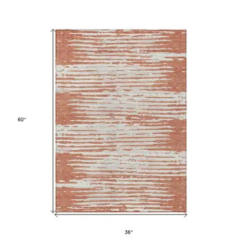 3' X 5' Coral And Ivory Striped Washable Indoor Outdoor Area Rug