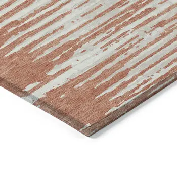 5' X 8' Coral And Ivory Striped Washable Indoor Outdoor Area Rug
