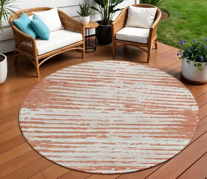 8' Coral And Ivory Round Striped Washable Indoor Outdoor Area Rug