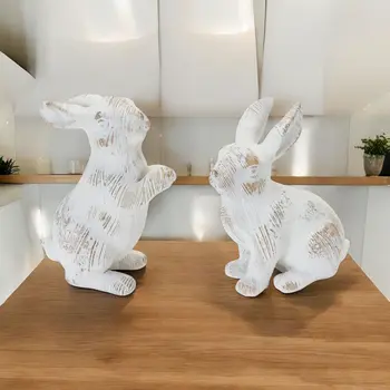 Set of Two White Resin Figurine Tabletop Sculpture