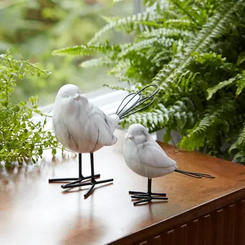 Set of Four White Polyresin Figurine Tabletop Sculpture