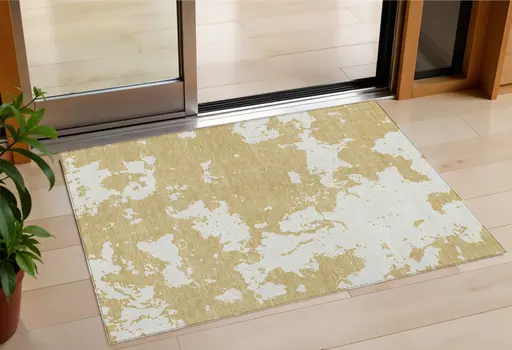 3' X 5' Gold And Ivory Abstract Washable Indoor Outdoor Area Rug