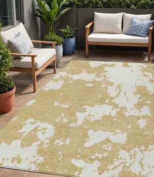 5' X 8' Gold And Ivory Abstract Washable Indoor Outdoor Area Rug