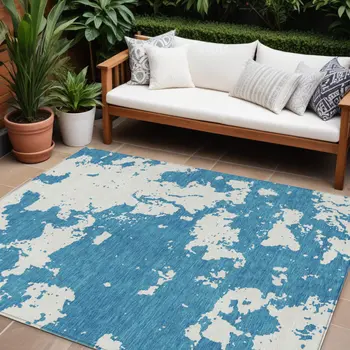 10' X 14' Teal Blue And Ivory Abstract Washable Indoor Outdoor Area Rug