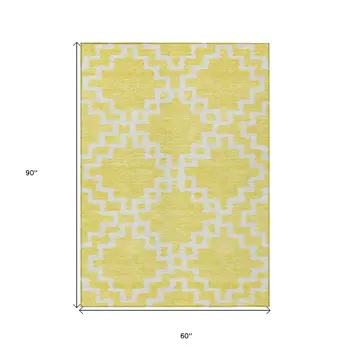 5' X 8' Yellow And Ivory Geometric Washable Indoor Outdoor Area Rug