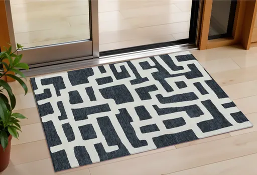 3' X 5' Black And Ivory Abstract Washable Indoor Outdoor Area Rug