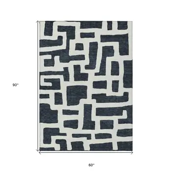 5' X 8' Black And Ivory Abstract Washable Indoor Outdoor Area Rug