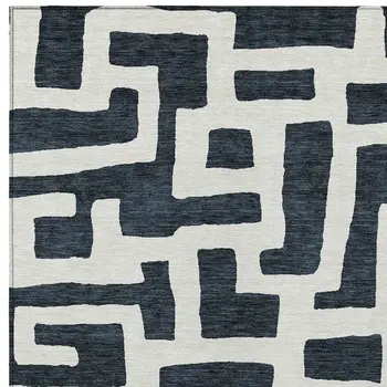 9' X 12' Black And Ivory Abstract Washable Indoor Outdoor Area Rug