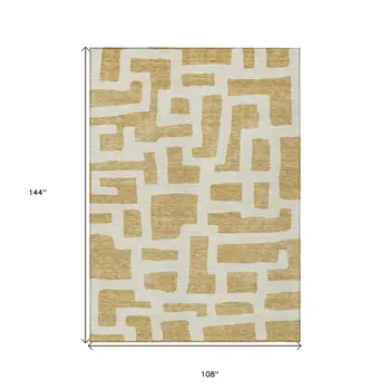9' X 12' Gold And Ivory Abstract Washable Indoor Outdoor Area Rug