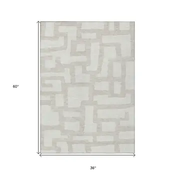 3' X 5' Ivory And Beige Abstract Washable Indoor Outdoor Area Rug