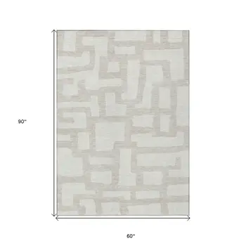 5' X 8' Ivory And Beige Abstract Washable Indoor Outdoor Area Rug
