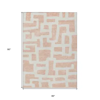 5' X 8' Peach And Gray Abstract Washable Indoor Outdoor Area Rug