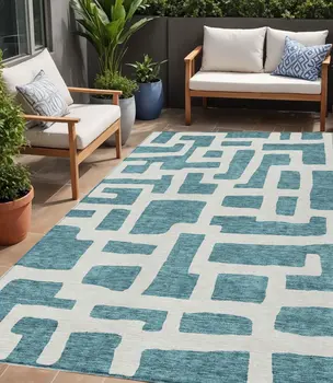5' X 8' Teal Blue And Ivory Abstract Washable Indoor Outdoor Area Rug