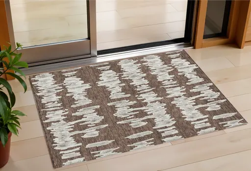 3' X 5' Brown Ivory And Gray Striped Washable Indoor Outdoor Area Rug