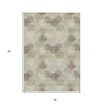 3' X 5' Beige Green And Ivory Polka Dot Washable Indoor Outdoor Area Rug