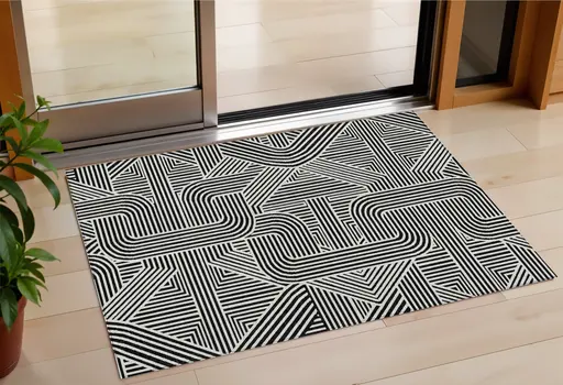 3' X 5' Black And Ivory Abstract Washable Indoor Outdoor Area Rug