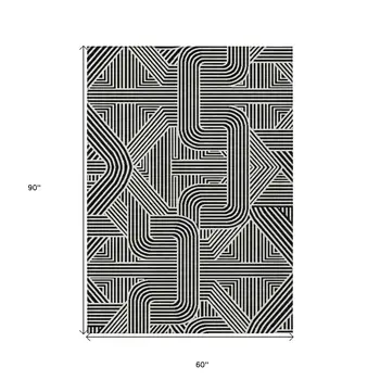 5' X 8' Black And Ivory Abstract Washable Indoor Outdoor Area Rug