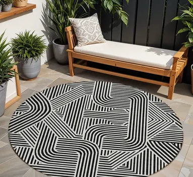 8' Black And Ivory Round Abstract Washable Indoor Outdoor Area Rug