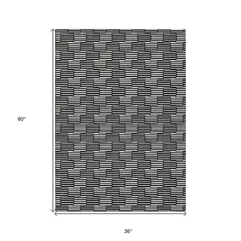 3' X 5' Black And Ivory Geometric Washable Indoor Outdoor Area Rug