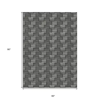 5' X 8' Black And Ivory Geometric Washable Indoor Outdoor Area Rug