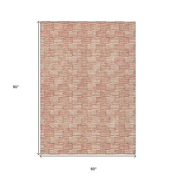 5' X 8' Salmon And Ivory Geometric Washable Indoor Outdoor Area Rug