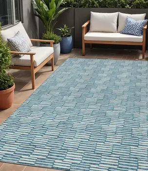 5' X 8' Teal Blue And Ivory Geometric Washable Indoor Outdoor Area Rug