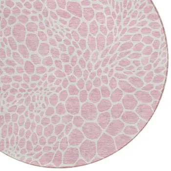 8' Pink And Ivory Round Geometric Washable Indoor Outdoor Area Rug