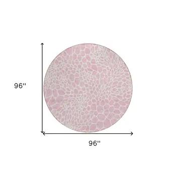 8' Pink And Ivory Round Geometric Washable Indoor Outdoor Area Rug