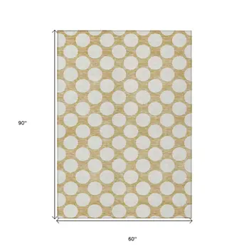 5' X 8' Gold And Beige Polka Dot Washable Indoor Outdoor Area Rug
