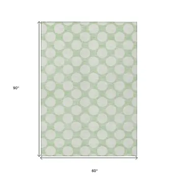 5' X 8' Mint Green And Ivory Polka Dot Washable Indoor Outdoor Area Rug
