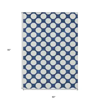 5' X 8' Navy Blue And Ivory Polka Dot Washable Indoor Outdoor Area Rug