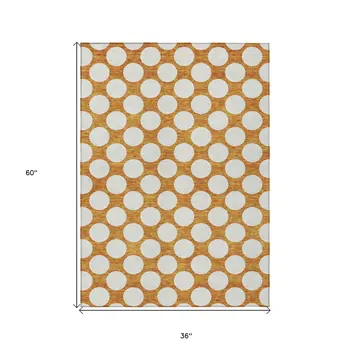 3' X 5' Orange And Ivory Polka Dot Washable Indoor Outdoor Area Rug