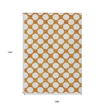 9' X 12' Orange And Ivory Polka Dot Washable Indoor Outdoor Area Rug