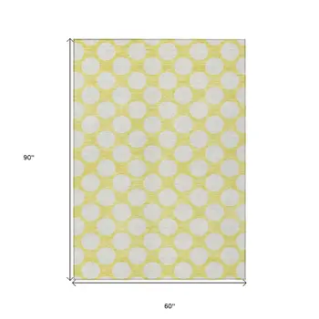 5' X 8' Yellow And Gray Polka Dot Washable Indoor Outdoor Area Rug