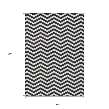 5' X 8' Black And Ivory Chevron Washable Indoor Outdoor Area Rug