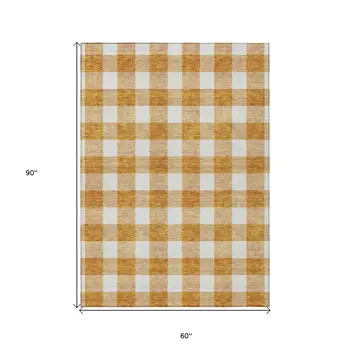 5' X 8' Orange And Beige Plaid Washable Indoor Outdoor Area Rug