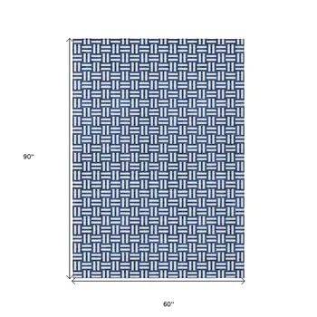 5' X 8' Navy Blue And Ivory Geometric Washable Indoor Outdoor Area Rug