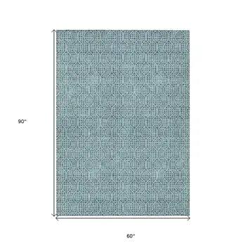 5' X 8' Teal Blue And Ivory Geometric Washable Indoor Outdoor Area Rug
