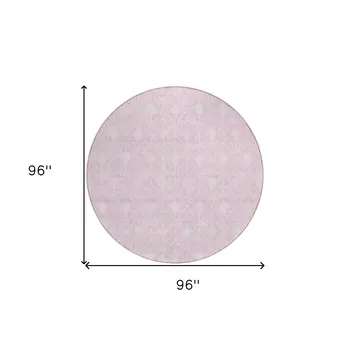8' Pink And Ivory Round Geometric Washable Indoor Outdoor Area Rug