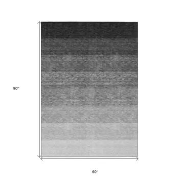 5' X 8' Black And Ivory Ombre Washable Indoor Outdoor Area Rug