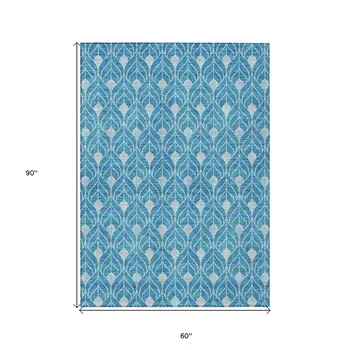 5' X 8' Teal Blue And Ivory Geometric Washable Indoor Outdoor Area Rug