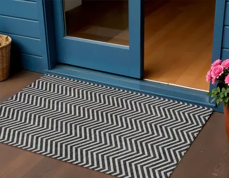 3' X 5' Black And Ivory Chevron Washable Indoor Outdoor Area Rug